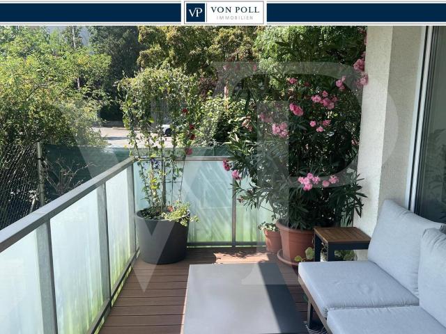 Attraktive 2 Zimmer Gartenwohnung mit Pool & Tiefgarage