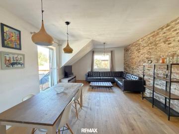 Attraktive 3 Zimmer Wohnung im Dachgeschoss mit Carport