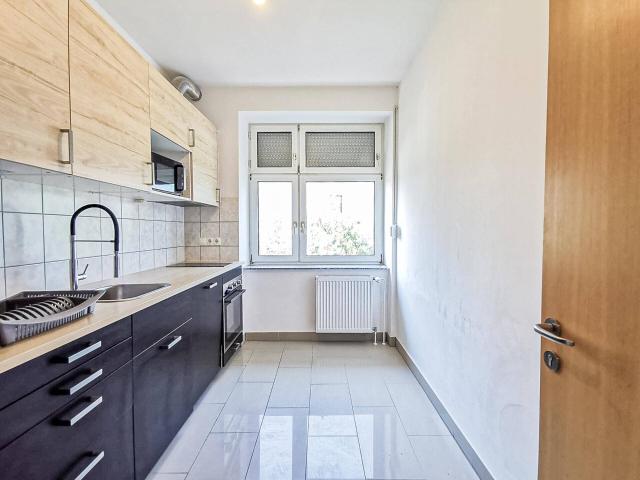 Attraktive 3 Zimmer Wohnung mit Gemeinschaftsgarten und Parkplatz
