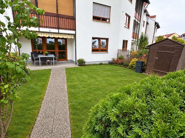 Attraktive 3 Zimmerwohnung mit Garten & Tiefgaragenstellplatz mit E Ladefunktion!