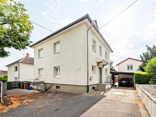 Attraktive 3 Zimmerwohnung mit Terrasse, Gartenanteil und Stellplatz