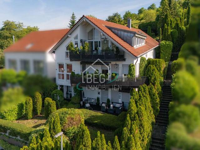 Attraktives Dreifamilienhaus in begehrter Aussichtslage – Wohnen und Vermieten unter einem Dach