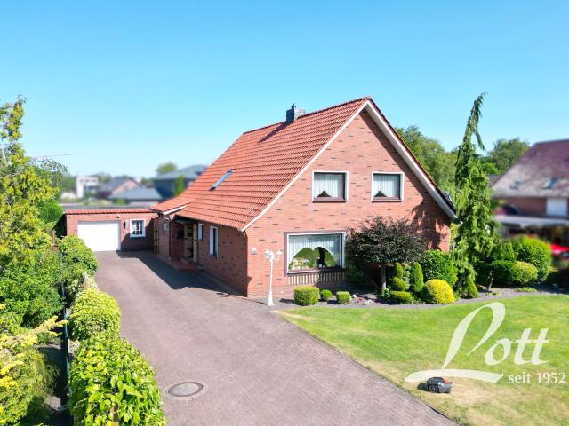 Attraktives Einfamilienhaus mit mögl. Einliegerwohnung in beliebter Kanallage in Augustfehn