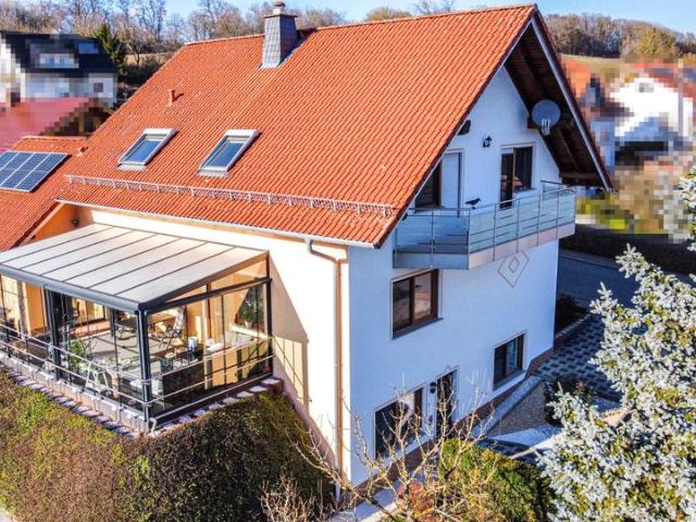 Attraktives Einfamilienhaus mit Wintergarten