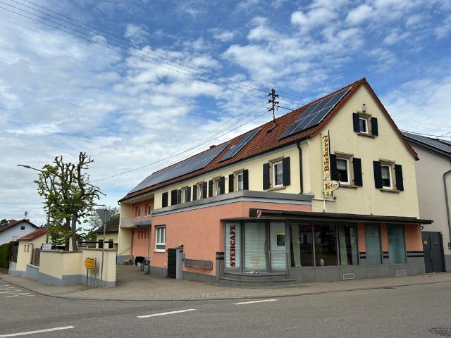 Attraktives Haus und Hofanwesen mit Wohnung und Gewerbe als Kapitalanlage