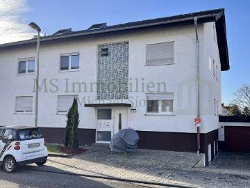 Attraktives Mehrfamilienhaus mit 7 Wohneinheiten, Garten und Stellplätzen in Lampertheim