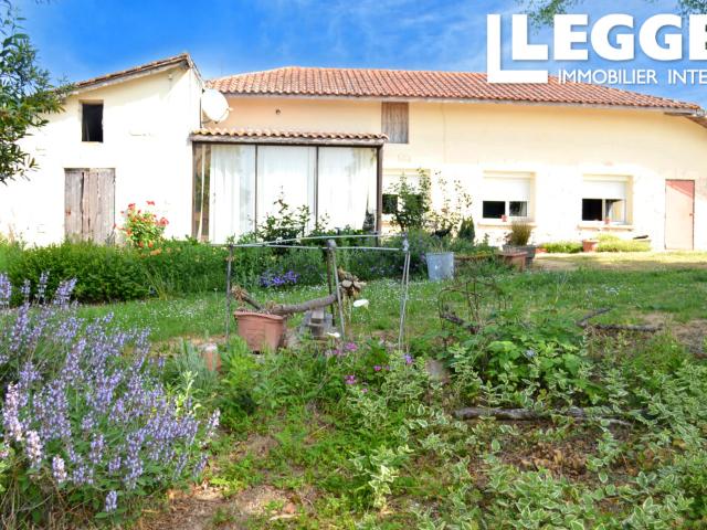 Au fond d'une impasse, maison de plain pied avec vue sur la plaine tonneinquaise. Jardin clôturé avec puits