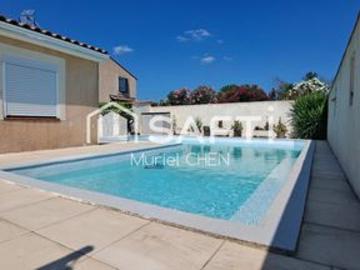 AUBORD: villa avec garage, jardin et piscine