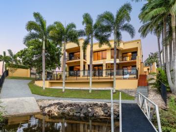 Secure a spacious, resort style waterfront home in a tightly held estate