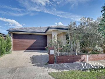 Exceptional Single Level Family Residence in a Highly Sought After Location