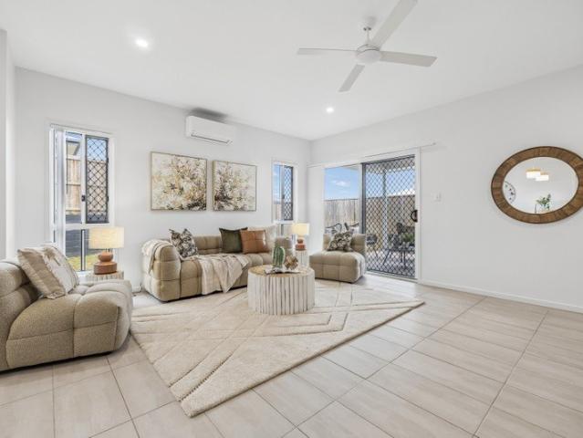 AUCTION IF NOT SOLD PRIOR Contemporary Family Living in Prestigious Sunvale Estate