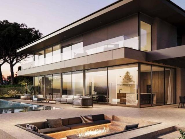 Außergewöhnliche Villa direkt am See – Infinity Pool & Wellnessbereiche