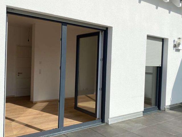 Außergewöhnliche Dachgeschosswohnung mit offenem Wohn Essbereich und großer Südloggia warten auf Sie