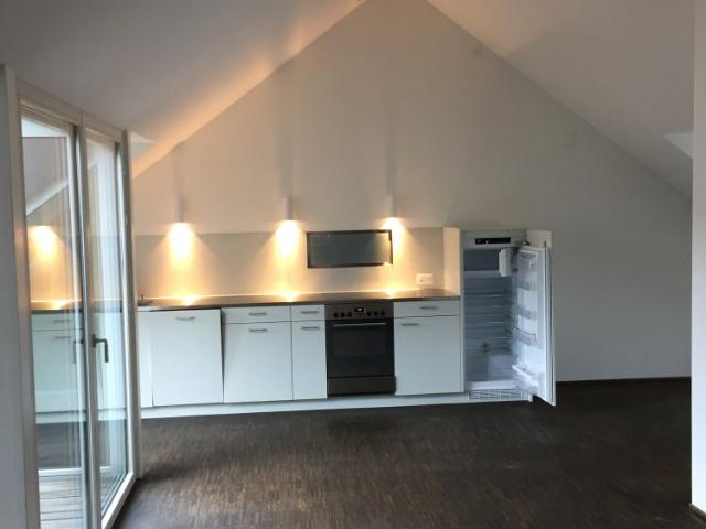 Aussergewöhnliche Dachwohnung mit Balkon