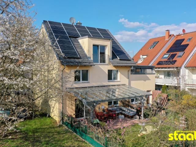 Außergewöhnliche Eigentumswohnung im Haus im Haus Konzept – Modernes Wohnen mit eigenem Garten