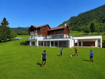 AUSSERGEWÖHNLICHE IMMOBILIE MIT PRIVATEM WELLNESSBEREICH UND PANORAMABLICK AUF DIE VORALPEN