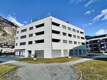 Außergewöhnliche Investitionsmöglichkeit  4,5 Zimmer Penthouse mit Panoramaterrasse im Dorfzentrum