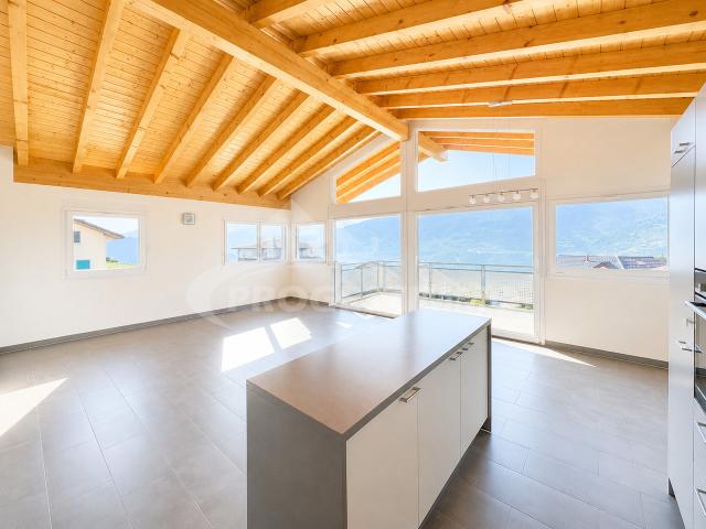 AUSSERGEWÖHNLICHE PENTHOUSE WOHNUNG MIT PANORAMABLICHT AUF DIE ALPEN