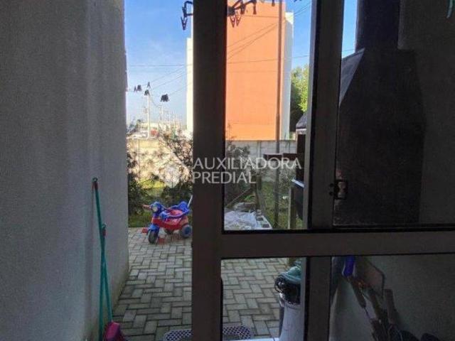 Auxliadora Predial vende Apartamento 2 dormitórios térreo com pátio