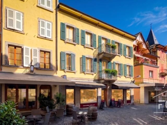 Avenue de la Gare 5 auf der Fußgängerstraße, gemischt genutztes Gebäude mit einer potenziellen Rendite von 5,94 %