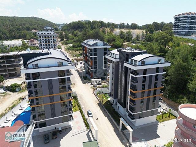 AVSALLARDA TATIL KEYFI SUNAN MODERN 1+1 DAIRE DENIZE SERVISLI, ZENGIN AKTIVITE ALANLI YAŞAM!
