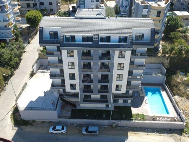 Avsallarda Yeni Binada Havuzlu Site İçinde Özel Tasarımlı 1+1
