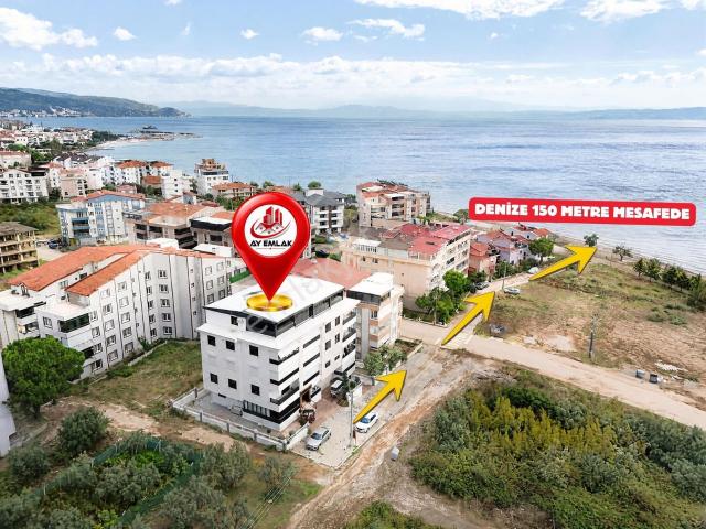 Ay Emlak'tan Karşıyaka'da Denize 150m Eşyalı 1+1 Kiralık Daire