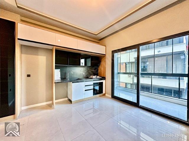 AY EMLAKTANAKÇAY'DA ARAKAT MUHTEŞEM TASARIM YERDEN ISITMALI KAPALI BALKONLU SATILIK 1+1 DAİRE