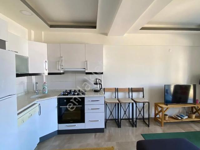 Aydın Didim Akbük'te Satılık Giriş Kat Havuzlu Eşyalı 1+1 Daire Denize 1200 Metre