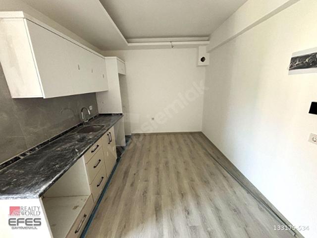 Aydın Kuşadası Davutlarda Sıfır Binada Ara Kat 1+1 Satılık Daire