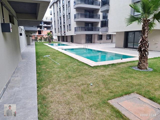 AYDIN KOÇARLI'DA YÜZME HAVUZLU,2+1,YENİ BİNADA,SATILIK DAİRE