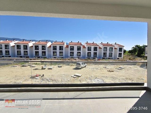 AYDIN KUŞADASI CAFERLİ MAHALLESİ'NDE SİTE İÇERİSİNDE HAVUZLU SATILIK 2+1 DAİRE