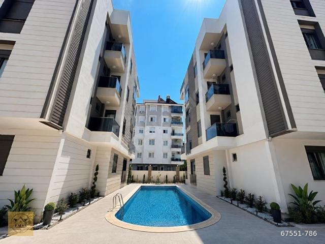 AYDOĞMUŞ'TA SİTE İÇİ HAVUZLU KATTA 2+1 EBV BANYOLU DAİRE
