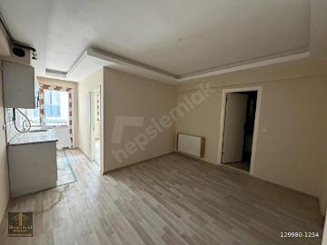 BAŞOĞLUN'DAN MERKEZİ KONUMDA DOĞALGAZLI BALKONLU SIFIR 1+1 DAİRE