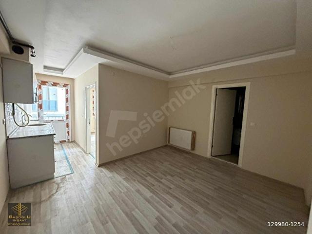 BAŞOĞLUN'DAN MERKEZİ KONUMDA DOĞALGAZLI BALKONLU SIFIR 1+1 DAİRE