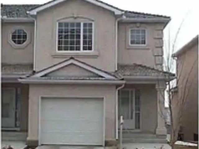 BACKING ON THE GREEN AREA, WALKOUT BASEMENT WITH FULL BATH