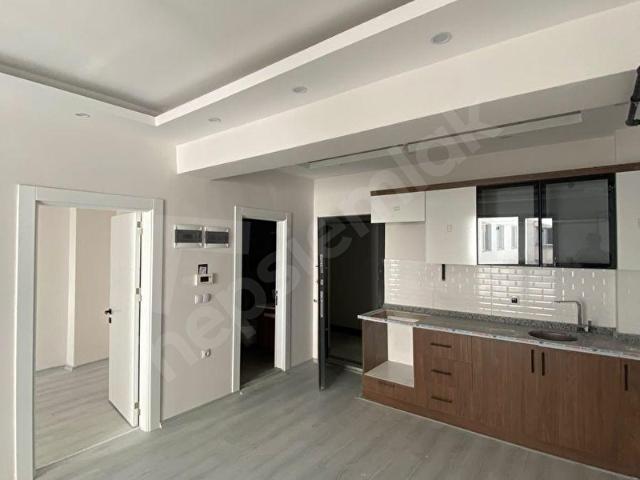 BAHÇIVAN MAHALLESiNDE KİRALIK SIFIR 1+1 DAİRE
