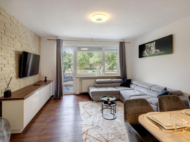 Balkonwohnung mit Blick in den Gemeinschaftsgarten