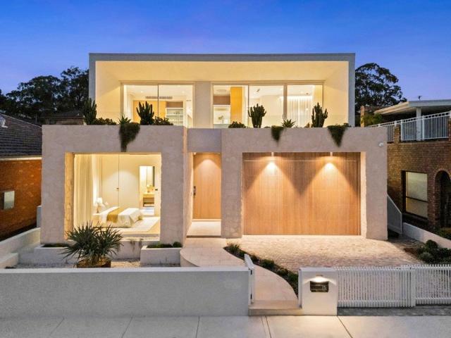 Bayfront Prestige In A Showpiece Architectural Residence with Water Views