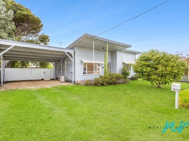 Bayside Beach House Opportunity on Generous Parcel in Blue Chip Location