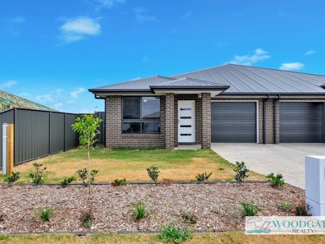 BE THE FIRST TO LIVE IN THIS BRAND NEW WOODGATE HOME
