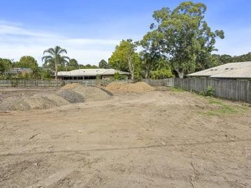 Benched flat land in a quiet suburban street