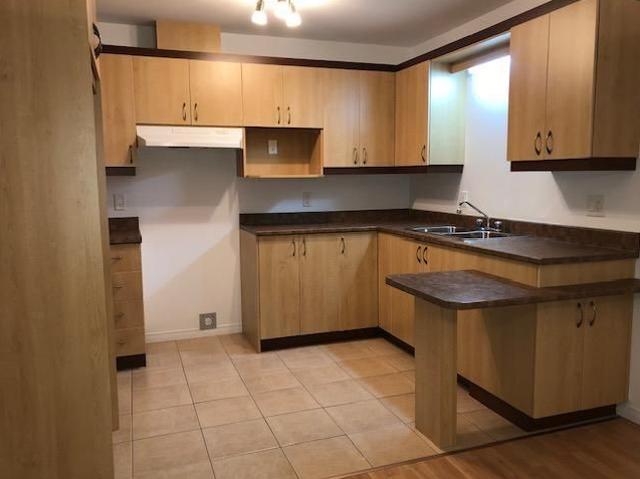 Beau et très grand 3.5 dans immeuble récent idéalement pour 55