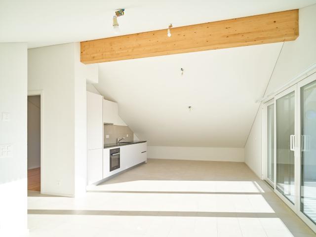 Beautiful 3.5 story attic with large bay window on protected balcony