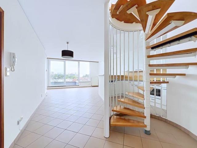 Beautiful 1 bedroom duplex with a mezzanine and balcony!