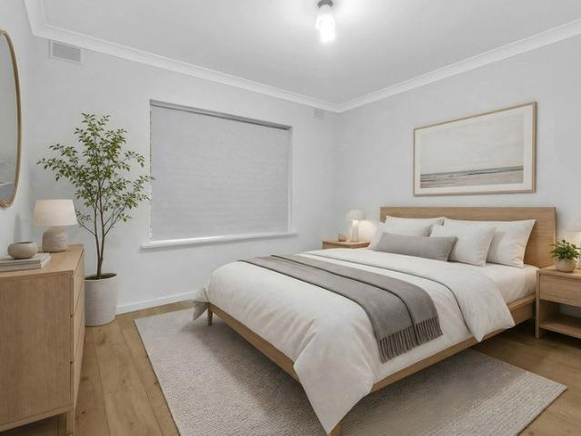 BEAUTIFUL 2 BEDROOM GROUND FLOOR UNIT WITH A LOCK UP GARAGE