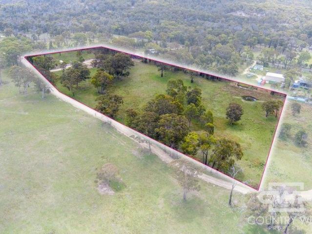 Beautiful 7.5 Acres Fully Fenced & With Building Entitlement
