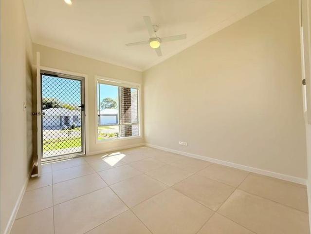 Beautiful 4 Bedroom NEW Family Home with Solar and Low Maintenance Yard