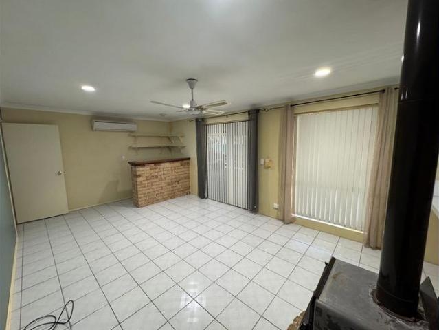Beautiful 4x2 brick and tiled home