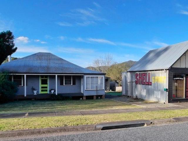 Beautiful Cottage and the original town shop with a huge garage